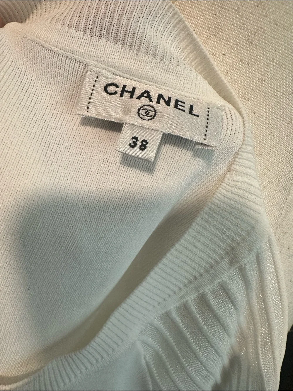 Chanel Women's Long-Sleeve Knit Top with Embellished Logo